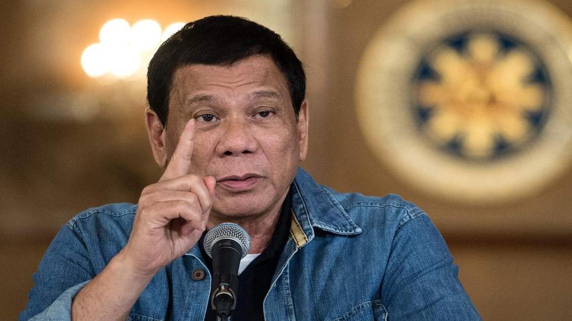 Philippine's President Rodrigo Duterte gestures as he answers a question during a press conference at the Malacanang palace in Manila on January 30.