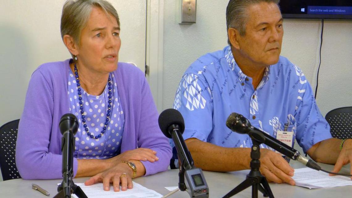 Hawaii Health Director Virginia Pressler, left, and Hawaii Tourism Authority CEO George Szigeti, right, talk to members of the media about new cases of rat lungworm disease on Wednesday, April 19, 2017, in Honolulu. Hawaii health officials say two more people have contracted rat lungworm disease after consuming a homemade drink contaminated with slugs.