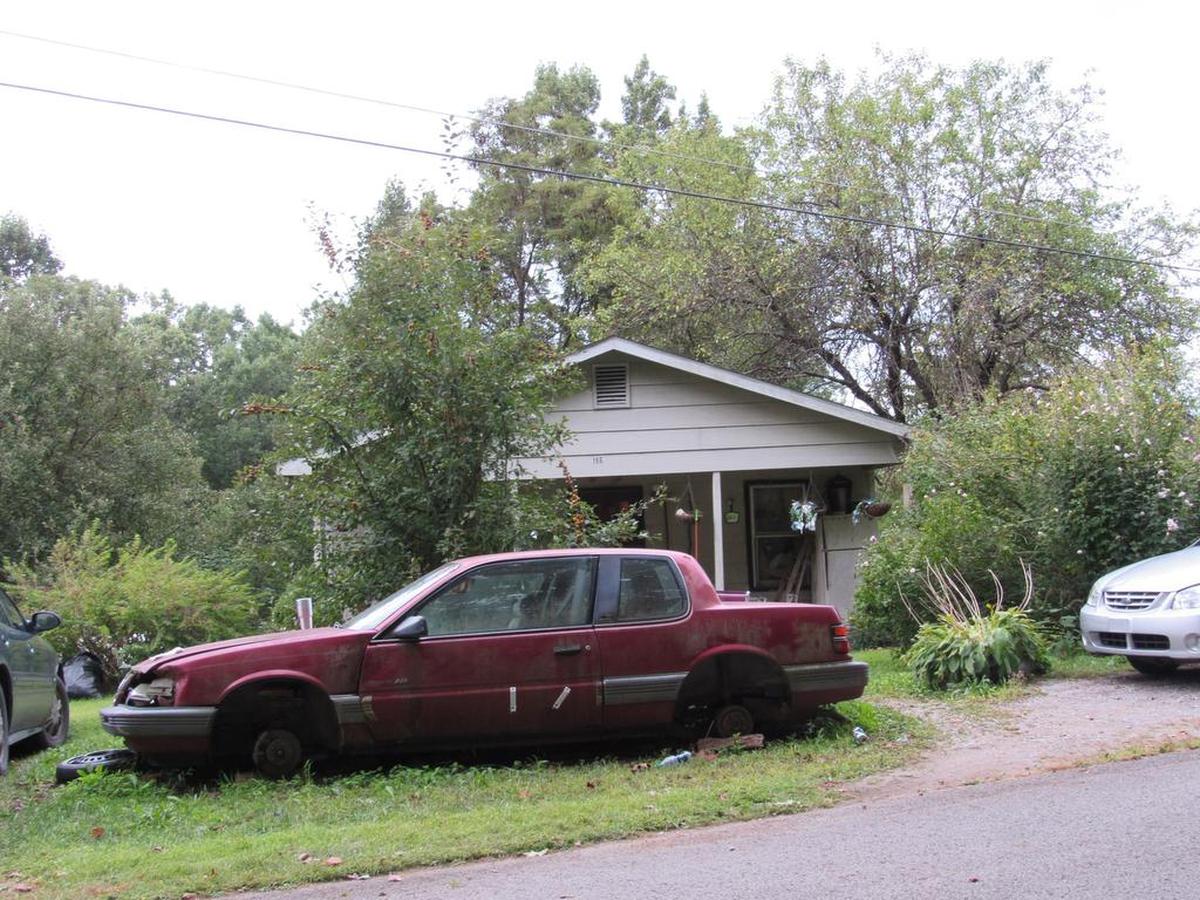 Lonnie Belt, a Jackson County man charged with beating a woman and throwing her off a cliff and then killing her 5-year-old son, lived in this house on Turkey Foot Road.