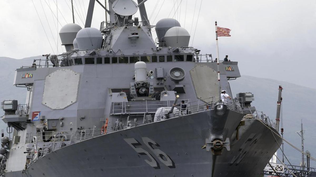 The U.S. Navy warship USS John McCain, an Arleigh-Burke class destroyer, seen here in a June 2014 photo as it is docked in the Philippines, suffered a collision with an oil tanker Monday near Singapore. Ten crew members are missing.