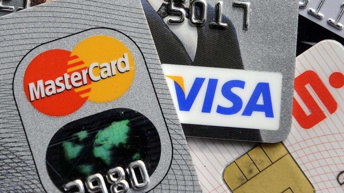 This Nov. 18, 2009, file photo, shows credit and bank cards.