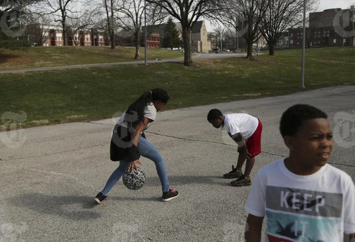 Ja’Kyiah Blackmon, her brother Jai’Vion and Martrell Trimble played basketball at Troost Park on the Paseo, a Kansas City boulevard that some local leaders want to rename for Dr. King.