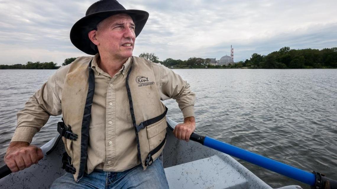 Nuclear Regulatory Commission engineer Lawrence Criscione rows near Exelon's Dresden Generating Station south of Chicago. Agency investigators sought his criminal prosecution after he told Congress in 2012 of the risks that Fukushima-like nuclear meltdowns could occur because older U.S. plants such as Dresden have inadequate flood protection. Comparing his treatment to Hillary Clinton's, Criscione says if he had classified information on a home email server, he would go to jail.