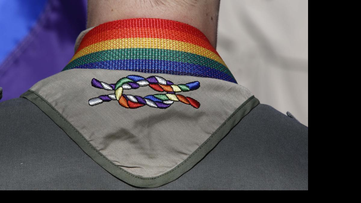 
A Boy Scout wears his kerchief embroidered with a rainbow knot during Salt Lake City’s annual gay pride parade on June 8. The Church of Jesus Christ of Latter-day Saints, which sponsors troops accounting for 1 in 5 Boy Scouts, says it is “deeply troubled” by the group’s national board to permit gay leaders on a troop-by-troop basis, despite an exemption permitted for troops with ties to groups with religious objections to homosexuality.
