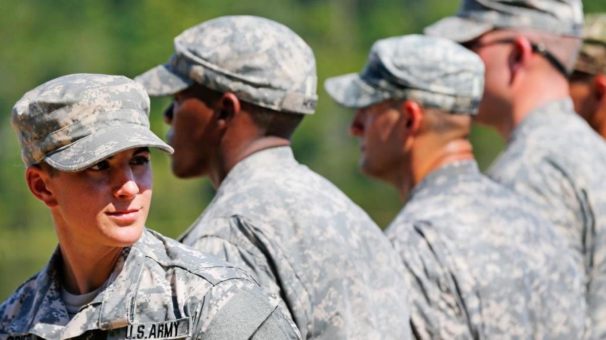U.S. Army Capt. Kristen Griest, left, of Orange, Conn., stands in formation during an Army Ranger School graduation ceremony on Aug. 21 at Fort Benning. Griest and 1st Lt. Shaye Haver became the first female soldiers to complete the Army's rigorous school, putting a spotlight on the debate over women in combat.