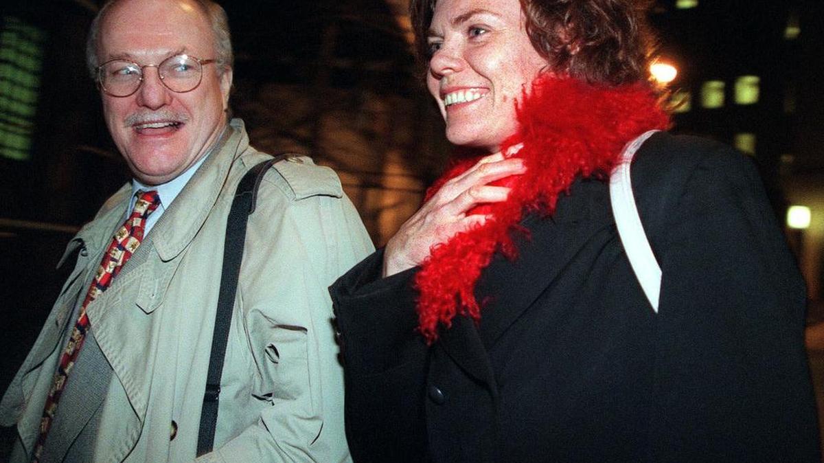 In this Dec. 7, 1999 photo, attorney Michael Carey, left, and his client Anette Sorensen leave New York's U.S. District court after the second day of trial of her $20 million lawsuit against the city. The jury awarded her $66,000, rejecting many of her claims but agreeing that she should not have been strip-searched, among other findings. The Danish mother, whose 1997 arrest for leaving her baby outside a New York eatery sparked an international debate about parenting, says she still feels she was unfairly vilified.