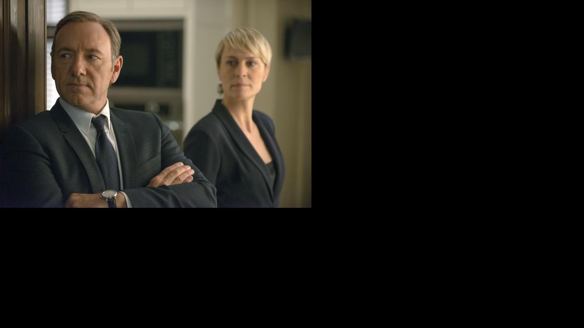 
This image released by Netflix shows Kevin Spacey as Francis Underwood, left, and Robin Wright as Clair Underwood in a scene from "House of Cards." Spacey was nominated for an Emmy Award for best actor in a drama series on Thursday, July 10, 2014, for his role as Frank Underwood. The 66th Primetime Emmy Awards will be presented Aug. 25 at the Nokia Theatre in Los Angeles. 
