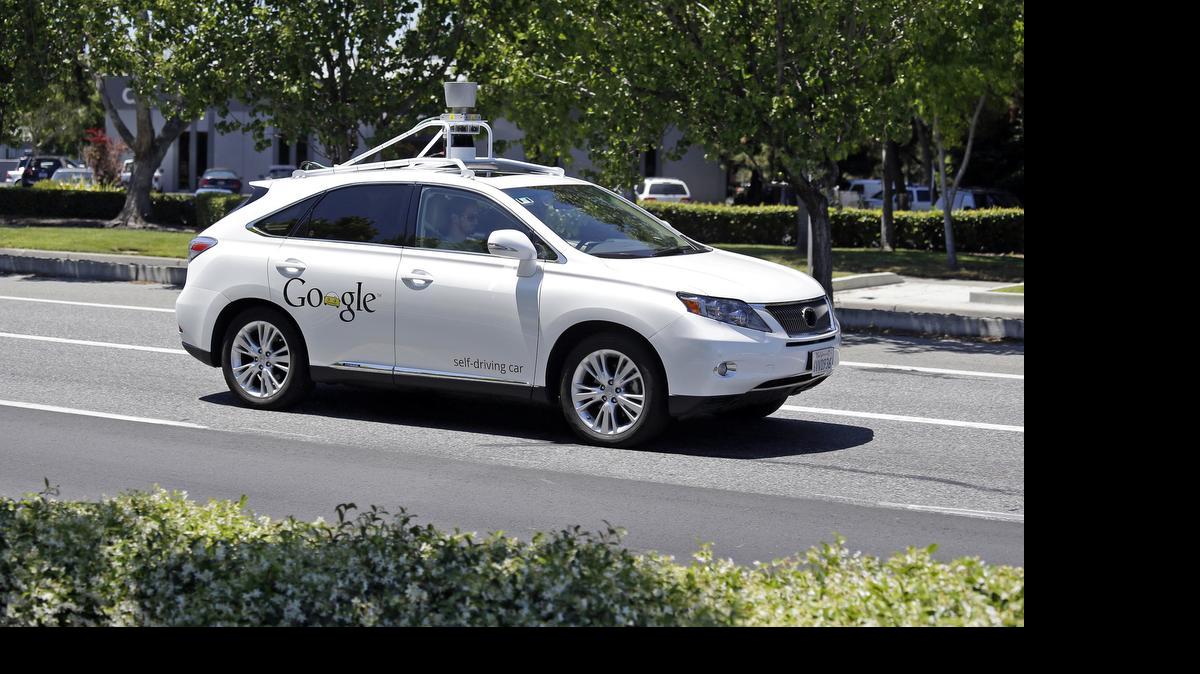 
A Google self-driving Lexus is seen at a Google event outside the Computer History Museum in Mountain View, Calif., on May 13, 2014. Of the nearly 50 self-driving cars rolling around California roads and highways, four have gotten into accidents since September. That’s when the state officially began permitting these cars of the future, which use sensors and computing power to maneuver around traffic. Three accidents involved souped-up Lexus SUVs run by Google Inc. The fourth was an Audi retrofitted by the parts supplier Delphi Automotive. Google and Delphi said the accidents were minor and their cars were not at fault.
