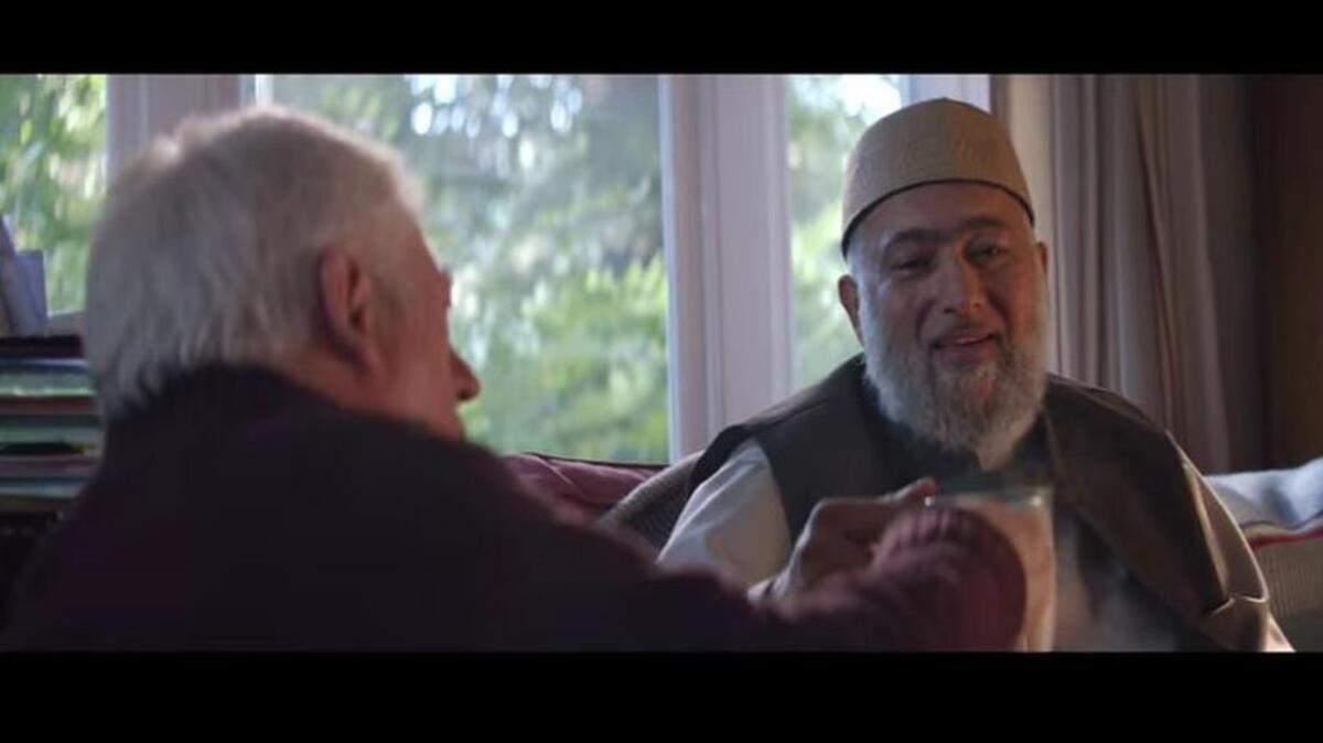 A Muslim cleric and a Christian priest share a cup of tea in a new Amazon ad.
