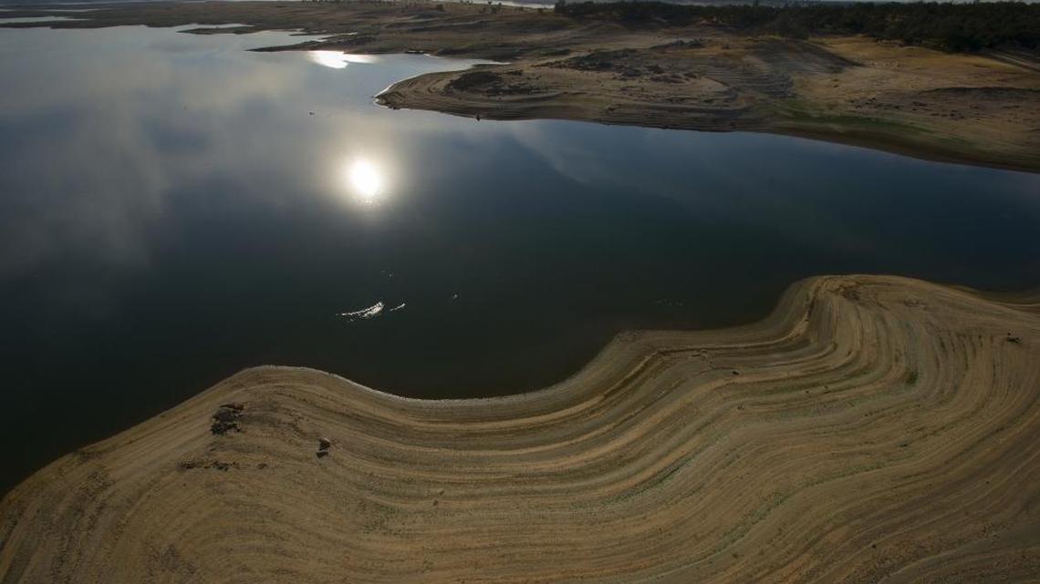 A view of the receding waterline from the east end of Folsom lake on Wednesday afternoon, October 14, 2015.