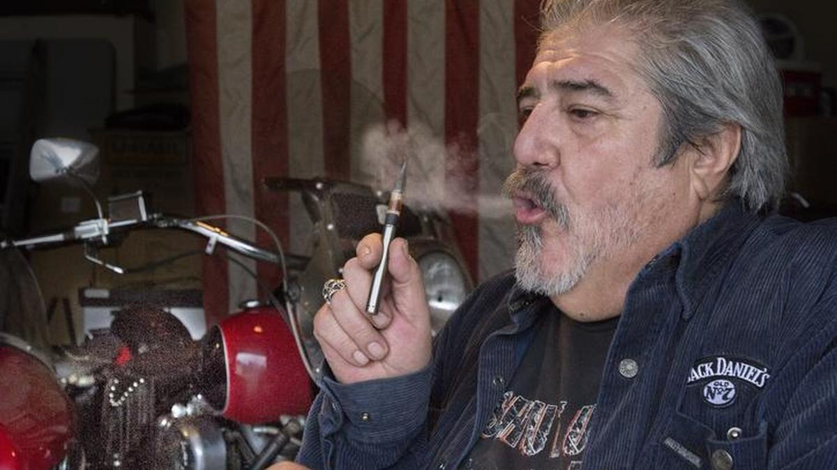 Daniel Porras, 61, vapes to get pure cannabinoid oil, the healing substance in marijuana, to manage his pain resulting from a 2005 motorcycle accident. Porras is an Army veteran who's dealing with severe nerve and muscle injuries to his left leg. He has no ankle or achilles tendon on the leg. Photo taken in Sultan, Wash., on Dec. 8, 2015.