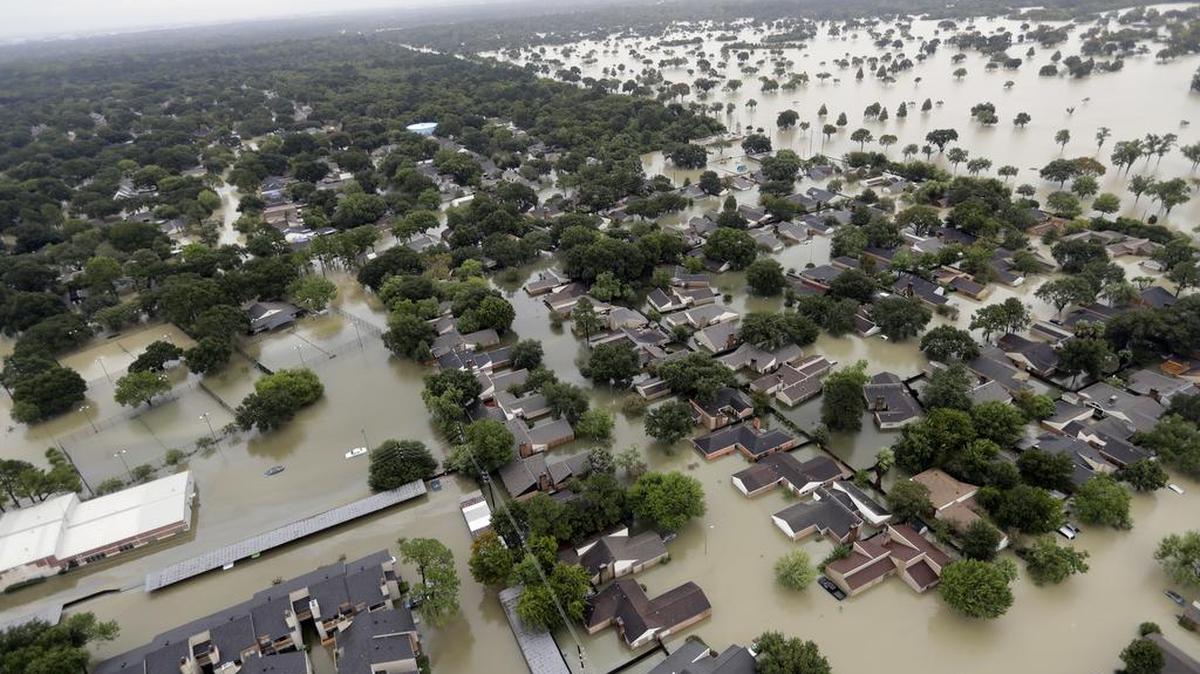 Neighborhoods near Addicks Reservoir are flooded by rain from Tropical Storm Harvey on Tuesday, Aug. 29, 2017, in Houston.