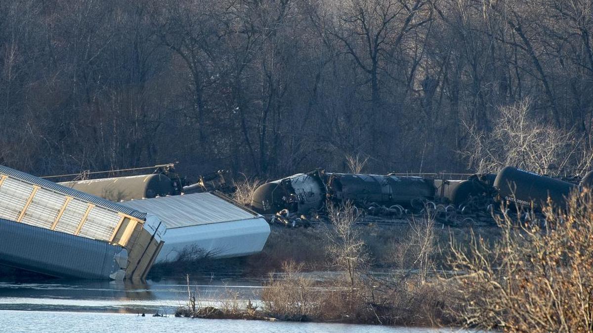 Train cars lie overturned outside of Alma, Wis. after derailing on Saturday. A second train, carrying crude oil, derailed Sunday near Watertown, Wis., forcing some evacuations.