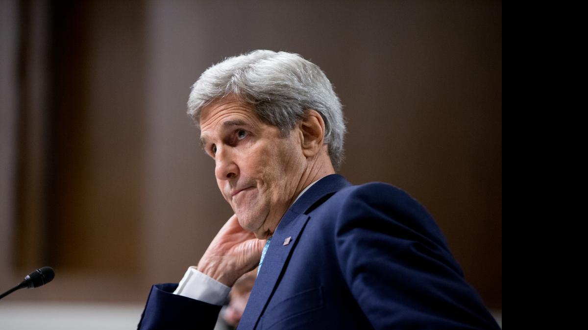 
Secretary of State John Kerry looks exasperated during often angry Senate hearing.
