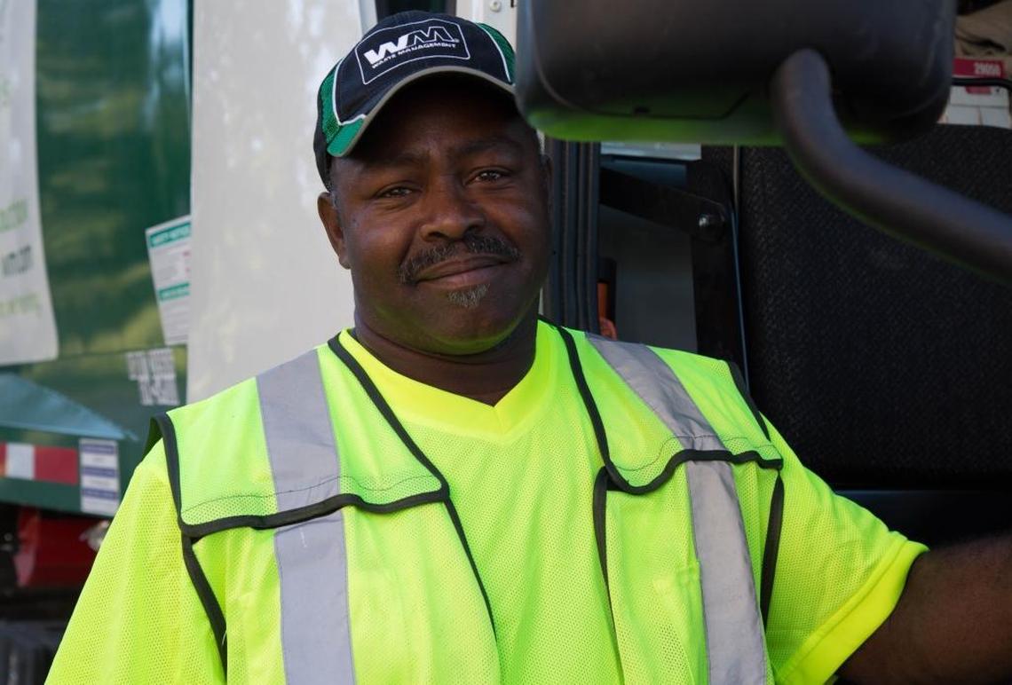 Sanitation worker Ira Campbell, 53, stops his truck along his trash pickup route in Albers, IL on Tuesday, June 27. Albers Village Hall will be recognizing Campbell for his service to the community during the Albers Blast-Off Parade and Fireworks on Monday, July 3.