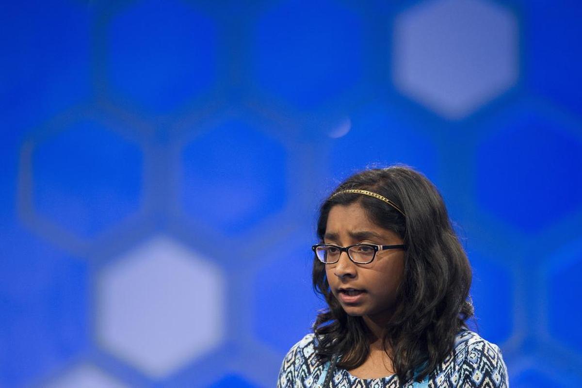 Ananya Vinay, 12, from Fresno, correctly spells “verdaccio” during the finals of the 90th Scripps National Spelling Bee on Thursday.