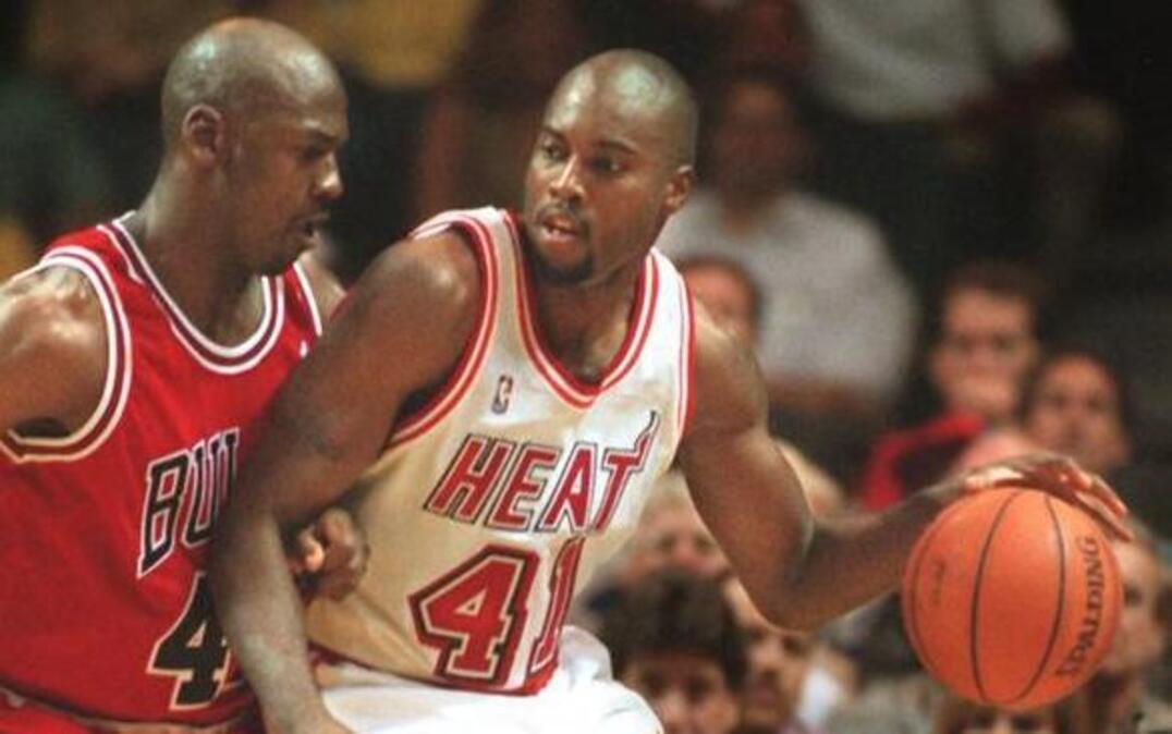 Miami Heat small forward Glen Rice goes up against Chicago Bulls star Michael Jordan during a game in April 1995. Rice, who retired from the NBA in 2004, is “almost broke,” according to court records made public this month in regards to a paternity suit filed against him.