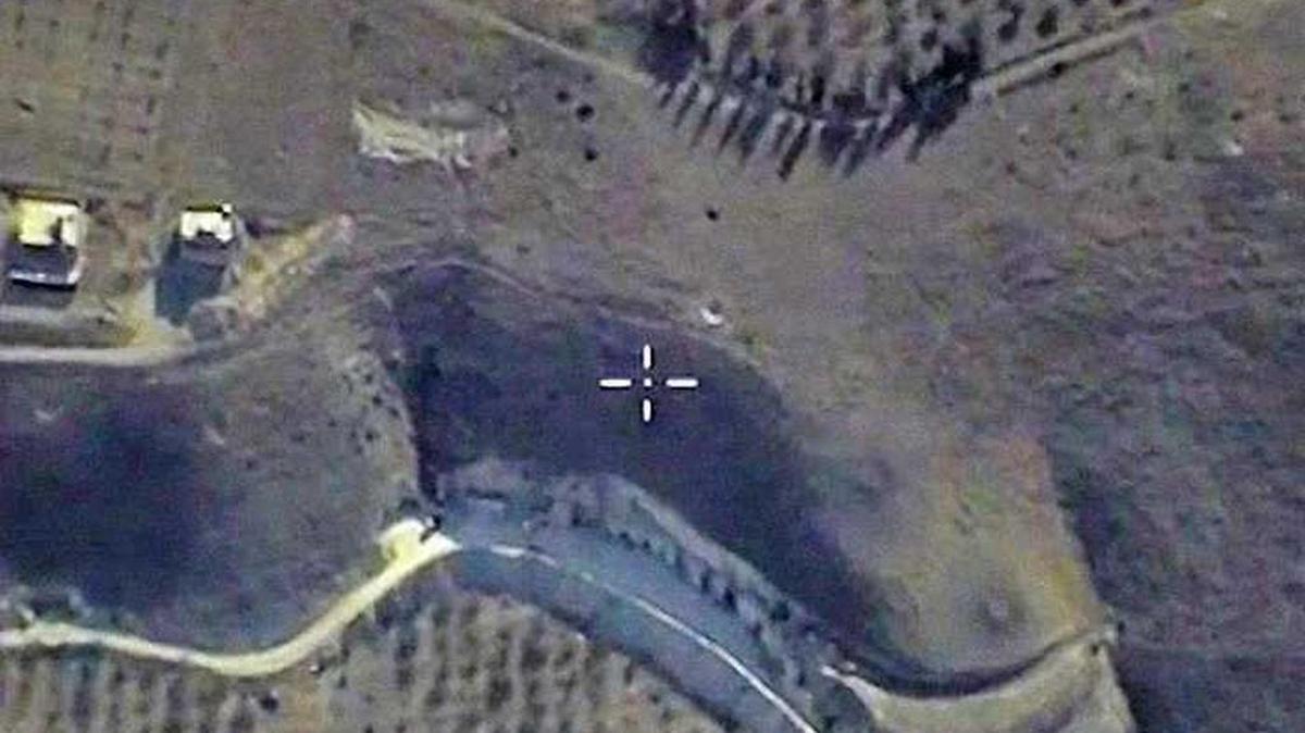 
This video image distributed Sept. 30, 2015, by the Russian Defense Ministry shows combat imagery from a Russian fighter jet over Syria. 
