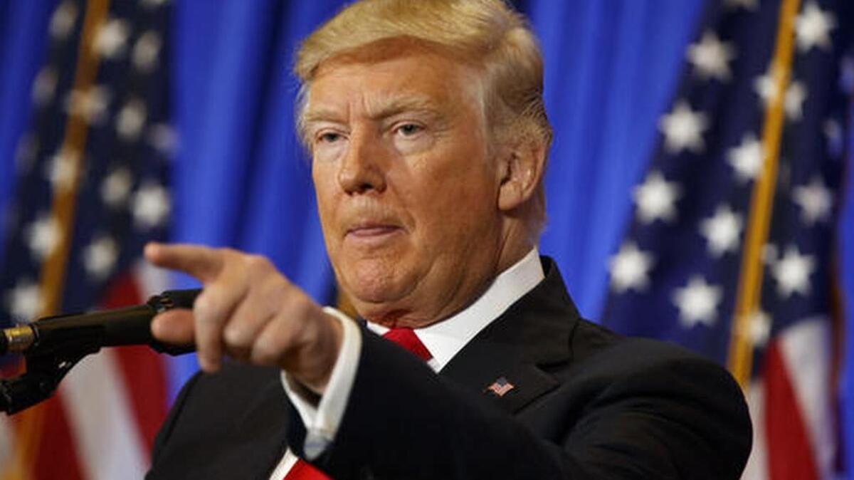 President-elect Donald Trump speaks during a news conference in the lobby of Trump Tower in New York, Wednesday, Jan. 11, 2017.