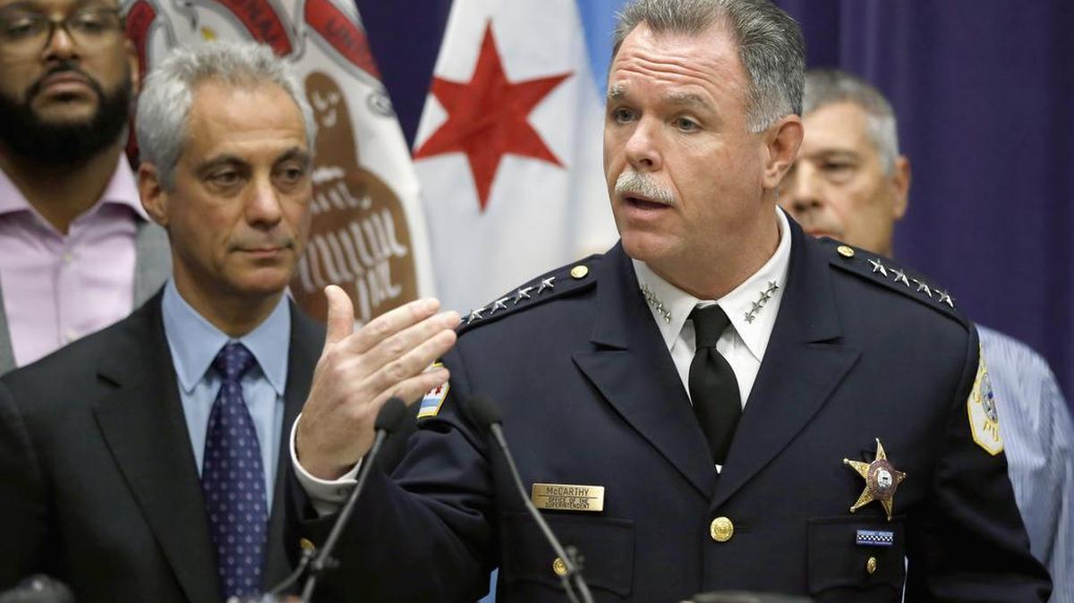 In this Nov. 24, 2015 file photo, Chicago Police Superintendent Garry McCarthy, right, speaks about first-degree murder charges against police officer Jason Van Dyke in the death of 17-year-old Laquan McDonald, as Mayor Rahm Emanuel looks on at left. Emanuel announced at a news conference Tuesday, Dec. 1, 2015, that McCarthy has been fired after a public outcry over the handling of the case.