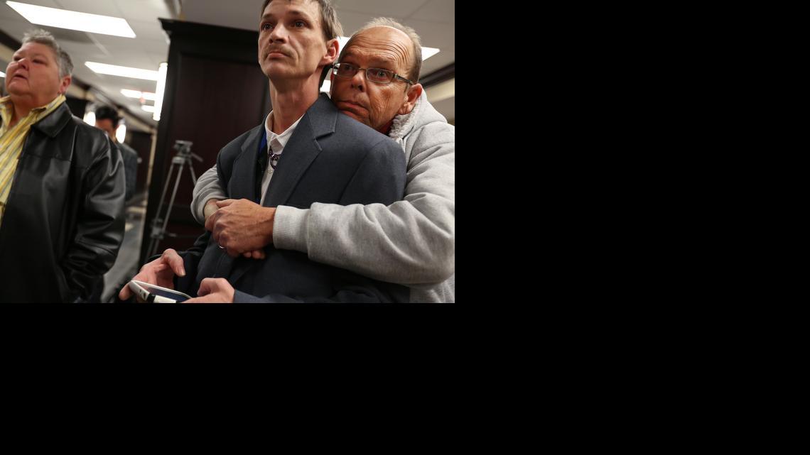 
John Humphrey, left, and James Strawser wait for a marriage license along with several other gay couples at the Mobile County Probate office in Mobile, Ala., on Tuesday, Feb. 10, 2015. A federal judge’s ruling went into effect Monday overturning Alabama’s ban on gay marriage after the U.S. Supreme Court refused the state’s request to stop the marriages. Alabama Chief Justice Roy Moore directed probate judges to refuse the licenses and resist what he called an “illegal” intrusion by the federal court.
