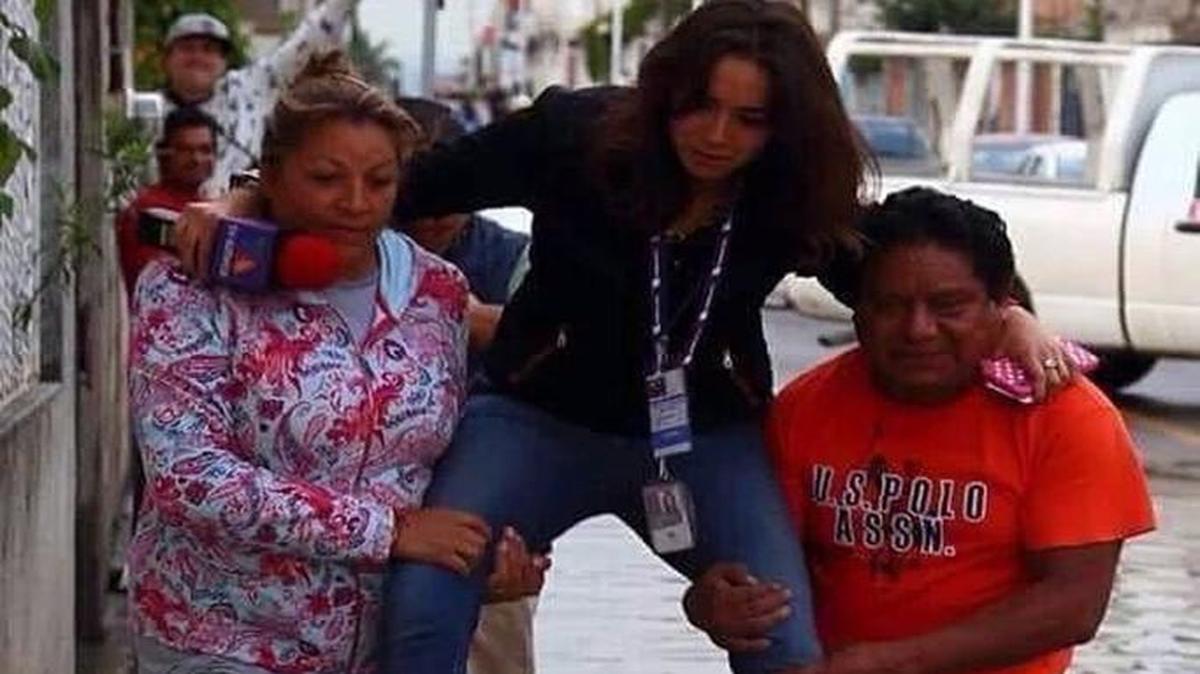 This image of Mexican TV reporter Lydia Cumming being carried through a flooded street while on assignment last week got her into a lot of hot water.