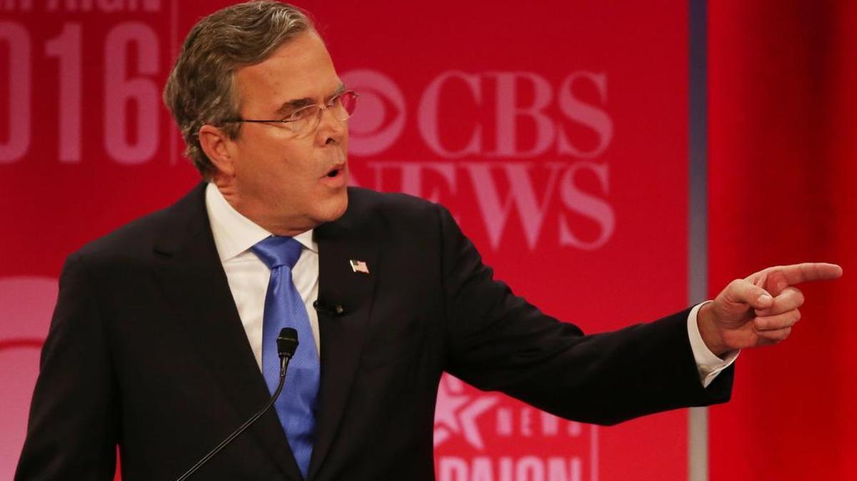 Former Republican presidential candidate, former Florida Gov. Jeb Bush responds to Republican presidential candidate, businessman Donald Trump during the CBS News Republican presidential debate at the Peace Center, Saturday, Feb. 13, 2016, in Greenville, S.C. (AP Photo/John Bazemore)
