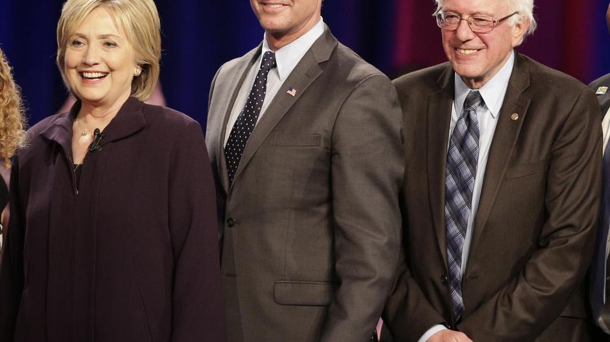 Democratic presidential candidates Hillary Rodham Clinton, from left, former Maryland Gov. Martin O’Malley and Sen. Bernie Sanders, I-Vt, pose for a photo after a democratic presidential candidate forum at Winthrop University in Rock Hill, S.C., Friday, Nov. 6, 2015.