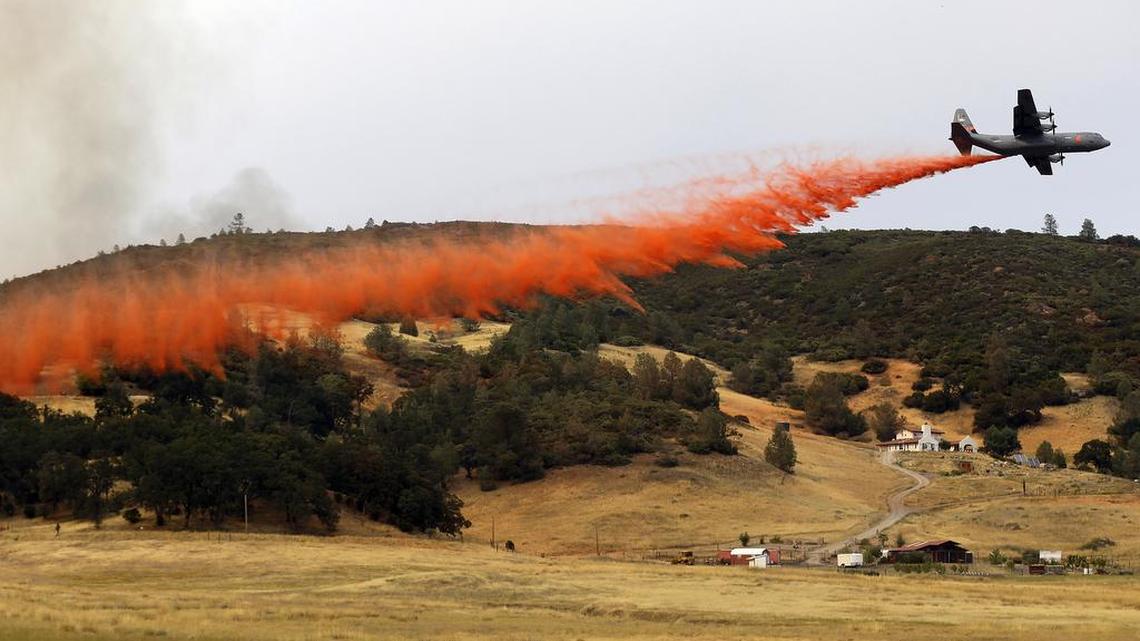
An air tanker drops fire retardant near Lower Lake, Calif., on Friday, July 31, 2015. A series of wildfires in drought-plagued California have been intensified by dry vegetation, triple-digit temperatures and gusting winds.
