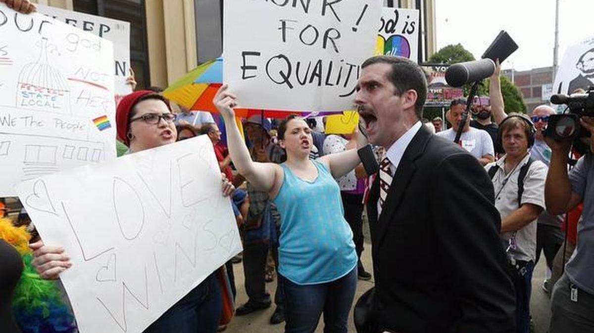 
Jeffrey Shook preached to the crowd outside the U.S. Courthouse as the hearing for Kim Davis took place. 
