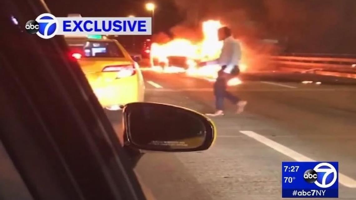 Video shows a man hailing a cab after a fiery crash on a New York expressway early Friday, October 13, 2017.