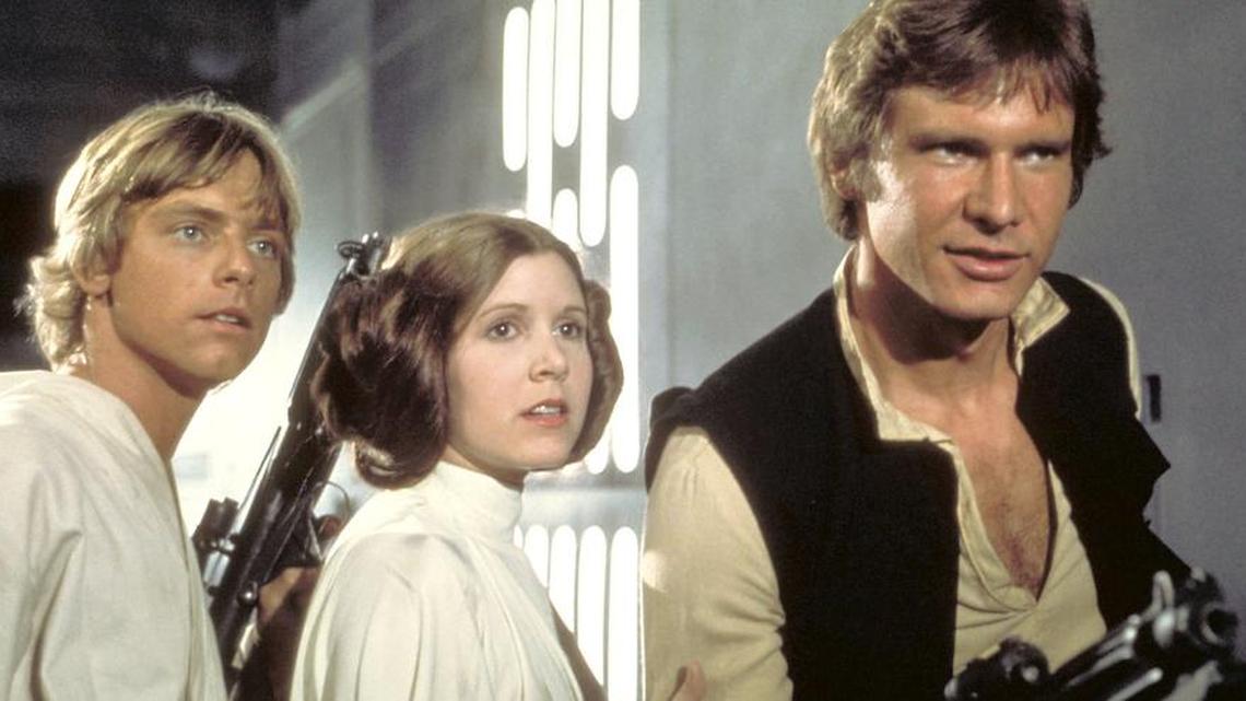 Mark Hamill, left, Carrie Fisher and Harrison Ford are joined by dentist J. Steven Abernathy in a “Star Wars” spoof video explaining the wonders of laser root canals.