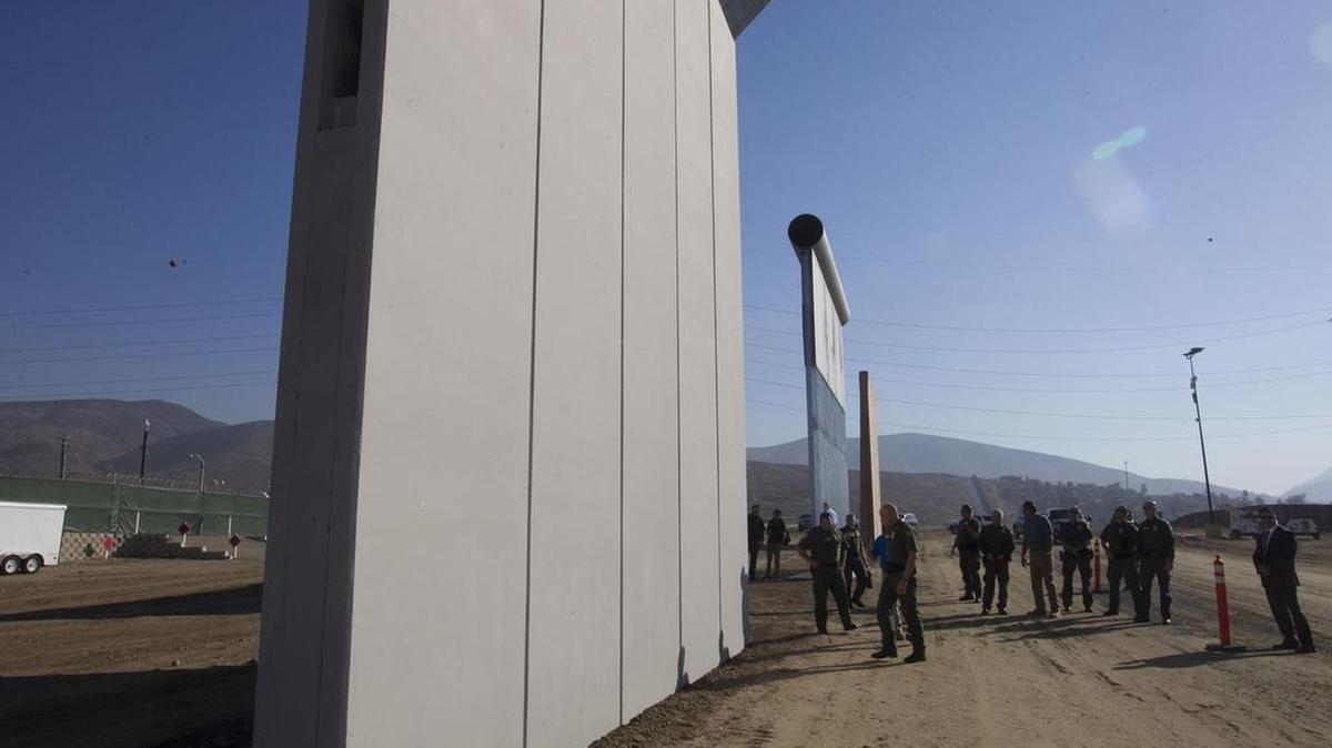 Ronald Vitiello, U.S. Customs and Border Protection’s acting deputy commissioner, tours the construction site where several prototypes of a border wall were constructed on Thursday, Oct. 26, 2017, in San Diego. Contractors have completed eight prototypes of President Donald Trump’s proposed border wall with Mexico, triggering a period of rigorous testing to determine if they can repel sledgehammers, torches, pickaxes and battery-operated tools.