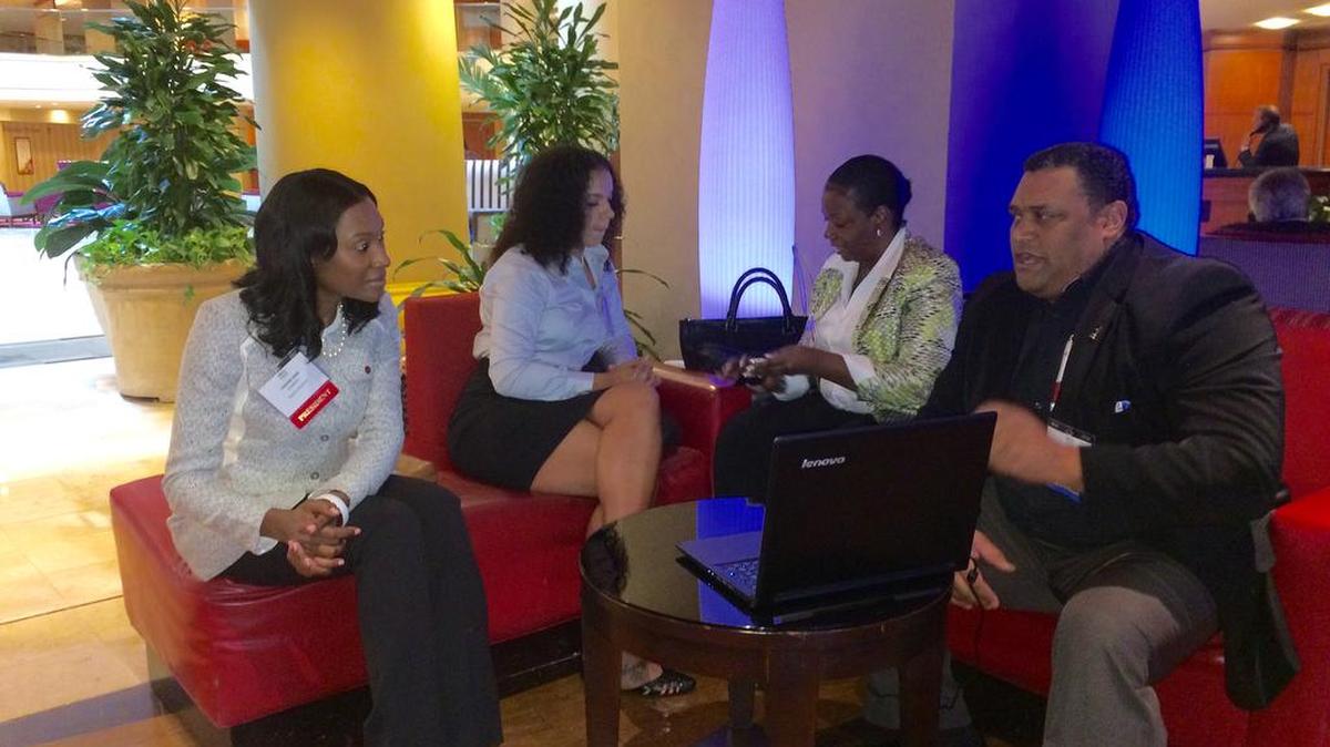 
Tashni-Ann Dubroy, president of Shaw University, and Historically Black Colleges and Universities All-Star student Bryann Guyton, also from Shaw, discuss potential partnerships with Michelle Anthony and Sean Heileman, both heads of companies at the 2015 HBCU conference on Sept. 22, 2015 in Washington D.C. The conference brought together hundreds of students, administrators and others to discuss the future of the schools.
