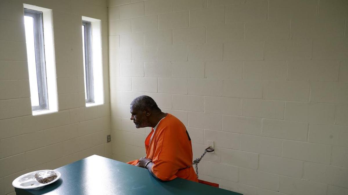 Inmate Kevin Dickens sits in a visitation room before eating a nutraloaf, a meal typically given to inmates for misbehavior involving food or bodily waste, during an Oct. 26, 2016, interview with The Associated Press at James T. Vaughn Correctional Center in Smyrna, Del. Dickens holds the dubious distinction of being on a loaf diet for longer than any other Delaware inmate.