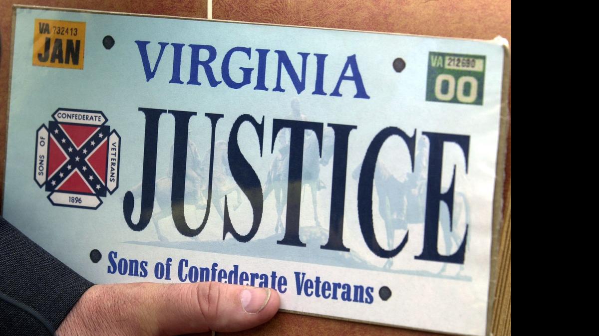 
 This 2002  photo shows a sample of the Sons of Confederate Veterans specialty Virginia state license plate. Virginia Gov. Terry McAuliffe said Tuesday, June 23, 2015 that he's moving to have the Confederate flag banished from state license plates in the wake of a massacre at a black church in Charleston, South Carolina. (Mark Gormus/Richmond Times Dispatch via AP)

