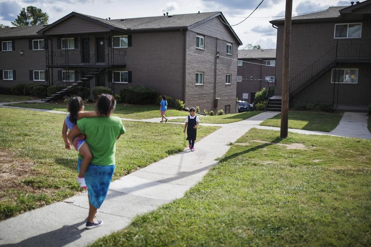 An apartment complex where residents keep watch for Immigration and Customs Enforcement agents and warn one another by phone in Chamblee, Ga., a suburb of Atlanta, Aug. 29, 2017. Few places simultaneously beckon and punish undocumented immigrants more than Atlanta, a boomtown of construction and service jobs where conservative politics has turned every waking day into a gamble.