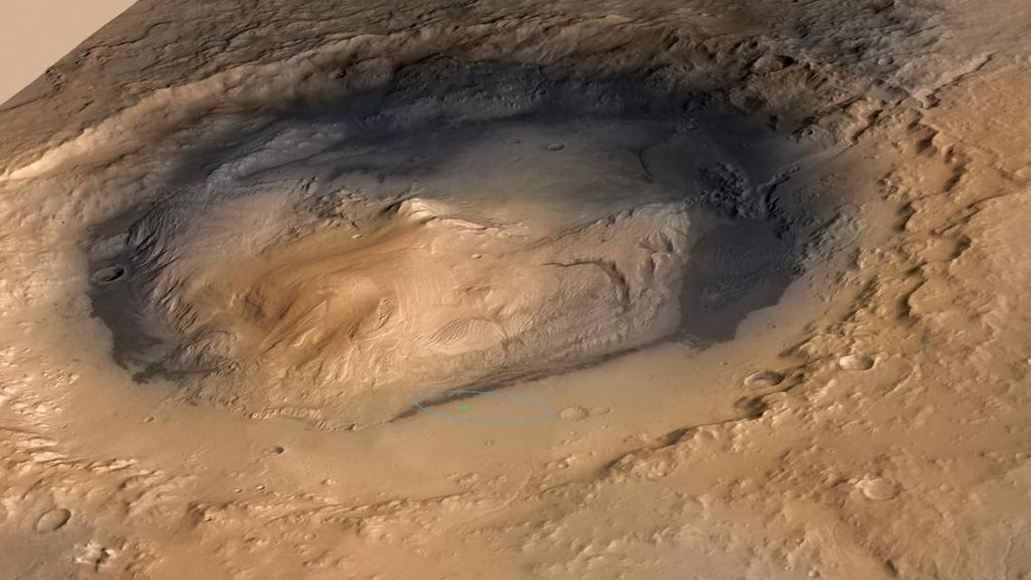 NASA’s Curiosity rover landed in the Martian crater known as Gale Crater, which is approximately the size of Connecticut and Rhode Island combined. Scientists say the crater had the right physical and chemical conditions for life for 700 million years. (NASA/JPL-Caltech/ESA/DLR/FU Berlin/MSSS/Abaca Press)
