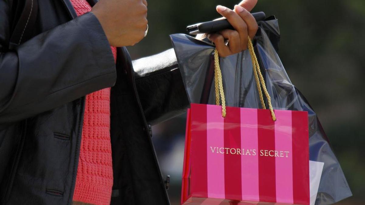 In this Nov. 17, 2009 file photo, a customer carries her purchase from a Victoria's Secret store. This photo is unrelated to the story.