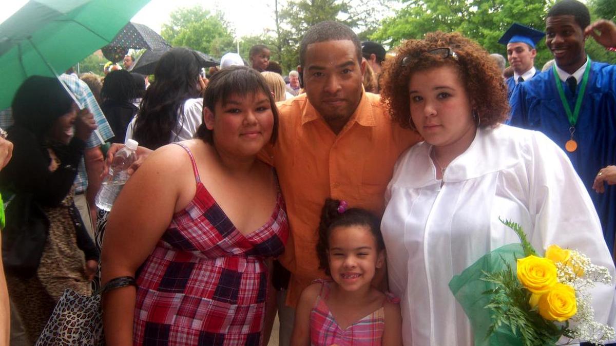 Myron Guthrie and his three daughters.