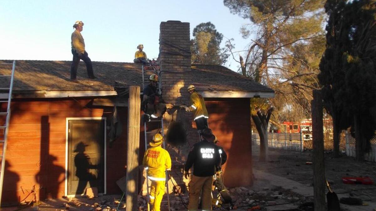 Lt. Brandon Pursell said deputies received a 911 call to the 16000 block of West Gale Avenue just before 3 p.m. After lighting a fire, the male homeowner heard screaming coming from somewhere inside the house. When the resident realized a person was in the chimney, he extinguished the fire.