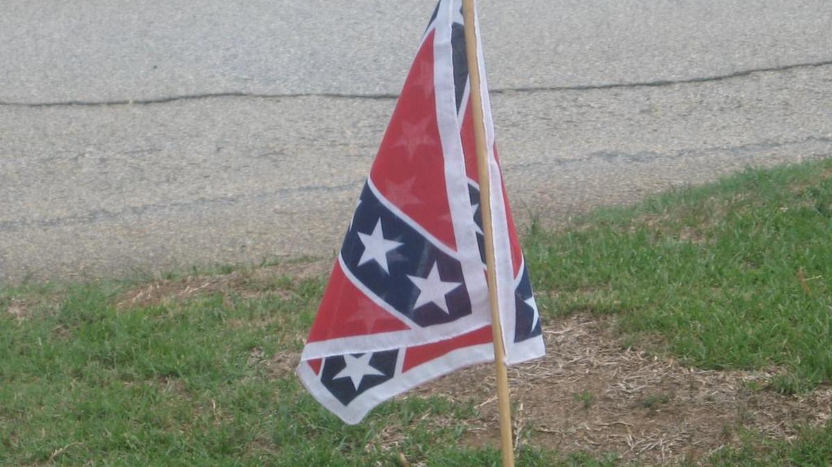A Marine was arrested for his activity at a pro-Confederate rally.