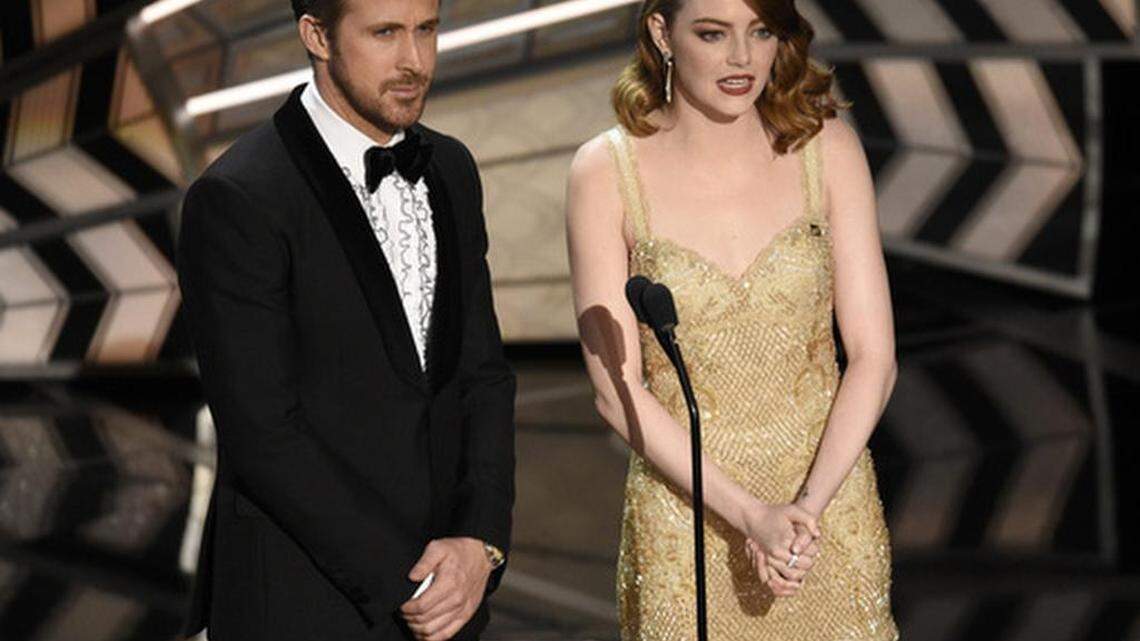 Ryan Gosling, left, and Emma Stone introduce a performance at the Oscars on Sunday, Feb. 26, 2017, at the Dolby Theatre in Los Angeles.