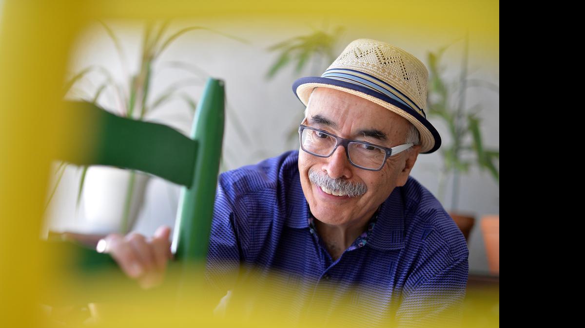 
Juan Felipe Herrera, 66, on the backyard patio of his home in Fresno, Calif.,on Wednesday. Herrera was named the 21st poet laureate of the United States.
