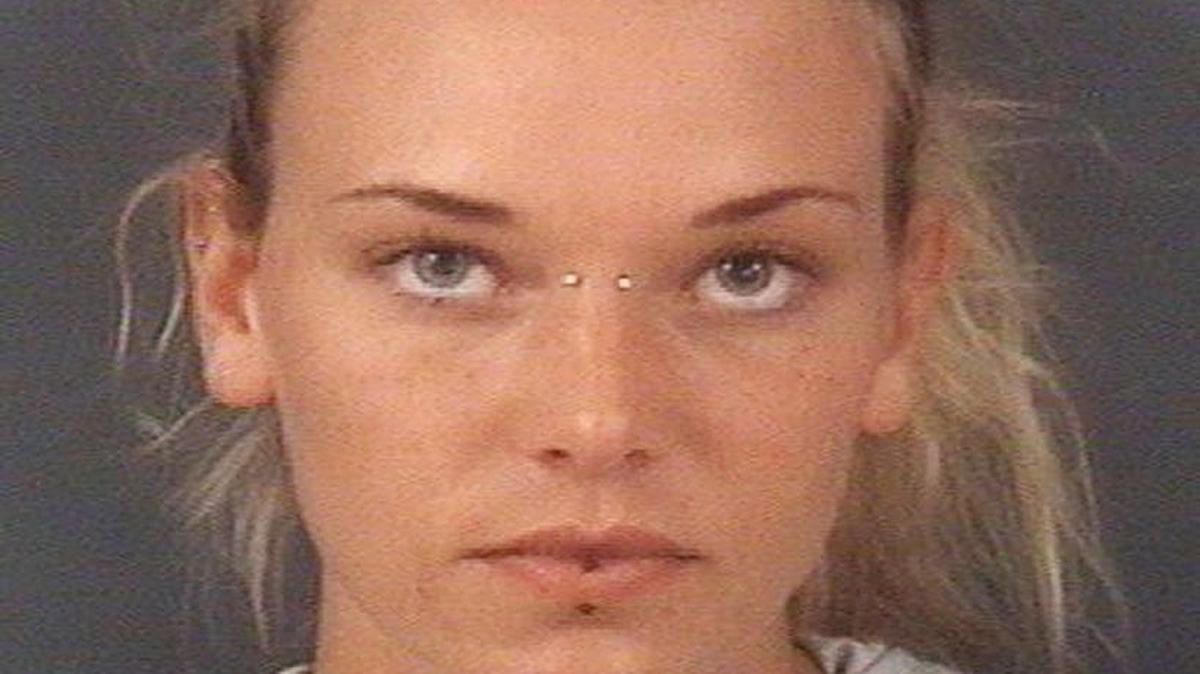 Marinna Rollins is seen in an undated photo released by the Cumberland County Sheriff's Office, in Fayetteville, N.C. Rollins was arrested Tuesday, April 25, 2017, and charged with cruelty to animals. The veteran was charged with tying her service dog to a tree and shooting it five times while a soldier filmed it. She was found dead Sunday, May 7, 2017.