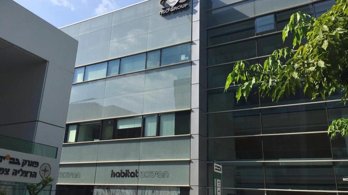The logo of the Israeli NSO Group company is still displayed Thursday, Aug. 25, 2016, on a building where it had offices until a few months ago in Herzliya, Israel. The company’s software has been linked to attempted hacks of iPhones in the United Arab Emirates and Mexico.
