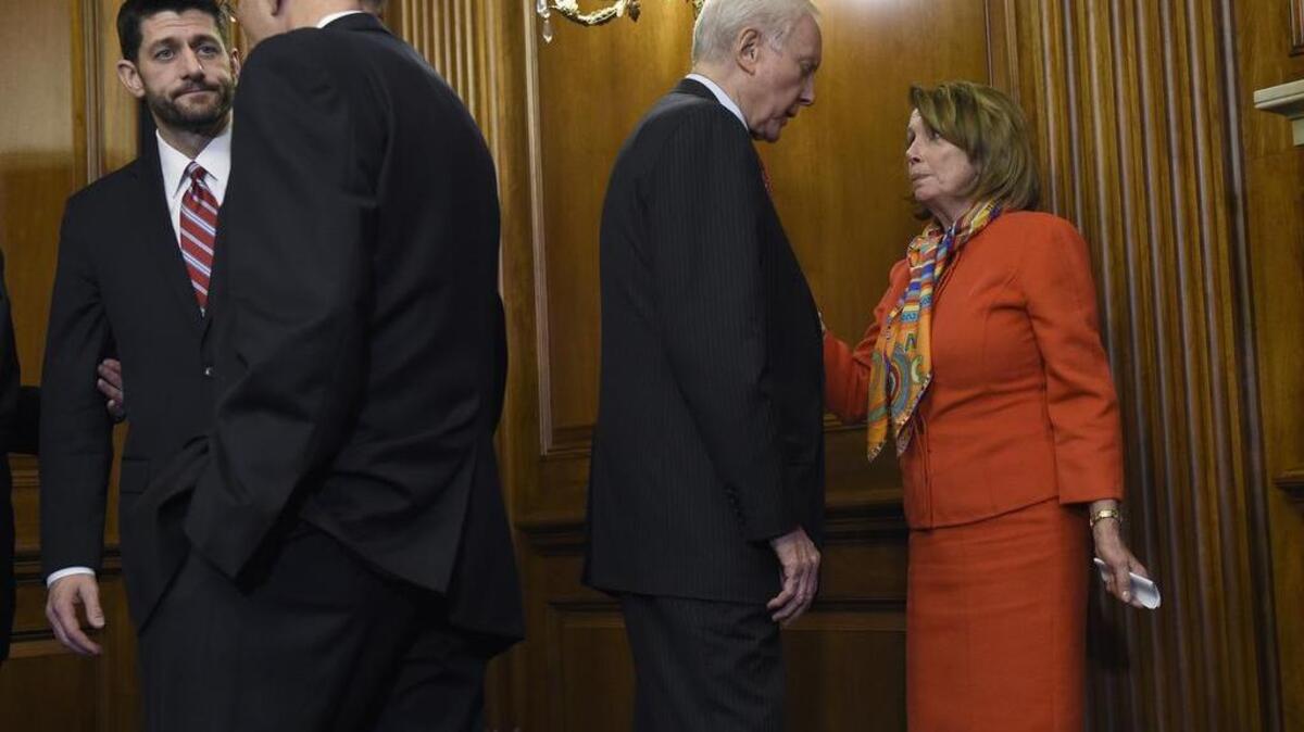 From left, House Speaker Paul Ryan, R-Wis., talks with Senate Health, Education, Labor and Pensions Committee Chairman Lamar Alexander, R-Tenn., as Sen. Orrin Hatch R-Utah, talks with House Minority Leader Nancy Pelosi, D-Calif., on Capitol Hill in Washington on Wednesday, Dec. 9, 2015, after Ryan signed legislation that changes how the nation's public schools are evaluated, rewriting the landmark No Child Left Behind education law of 2002.