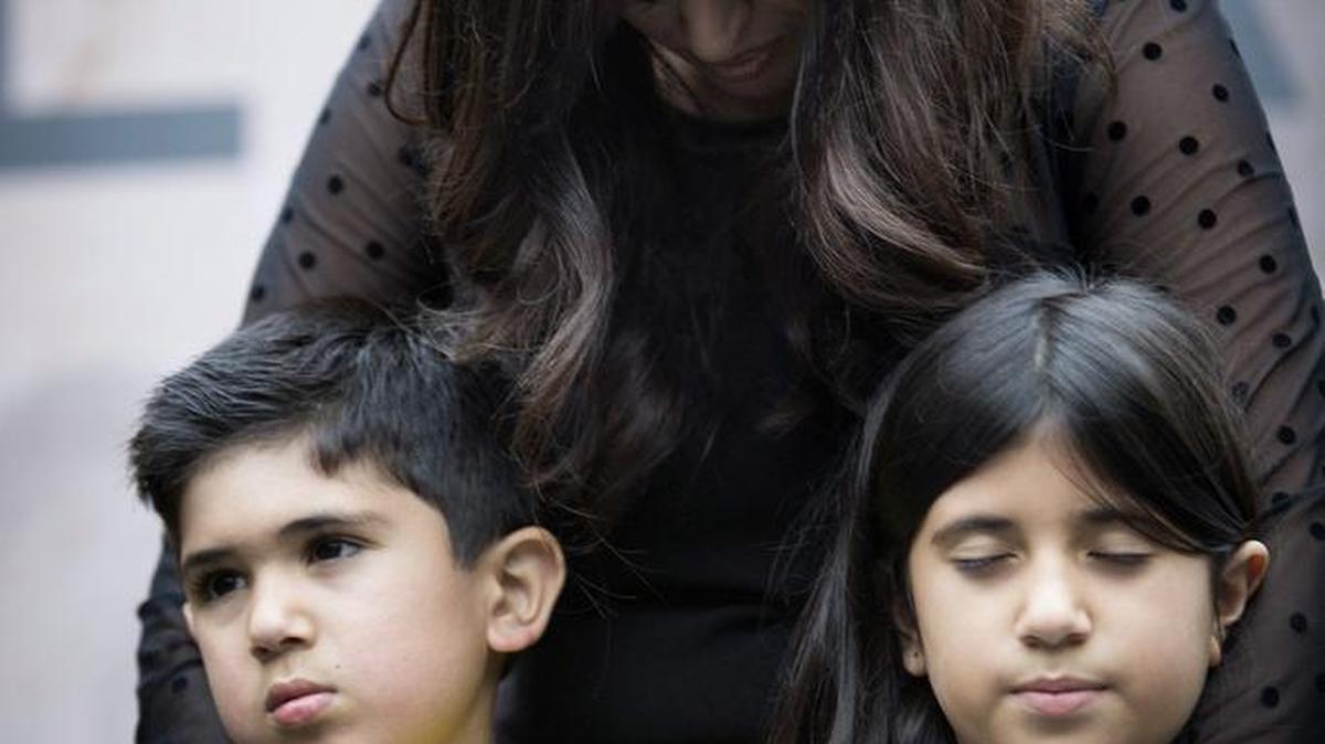 Naghmeh Abedini with her two children, Jacob, 6, left, and Rebekka, 8, at a prayer vigil outside the White House in Washington, D.C., Sept. 26, 2014.