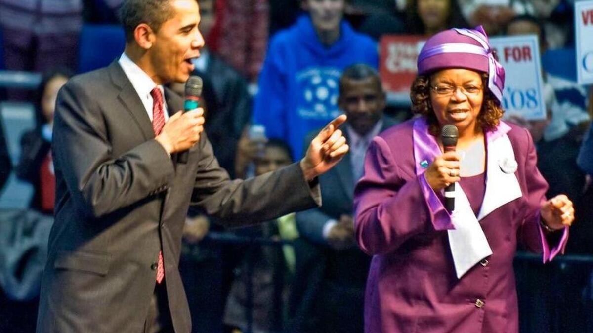 Candidate Barack Obama shares the stage with Edith Childs, of Greenwood, S.C., during the 2008 campaign.