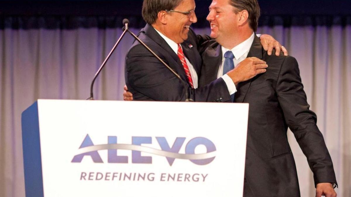 North Carolina Gov. Pat McCrory, left, embraces Norwegian entrepreneur Jostein Eikeland, founder, chairman and CEO of Alevo Group, during the Alevo Energy global launch and manufacturing facility opening in Concord, N.C., Oct. 28, 2014.